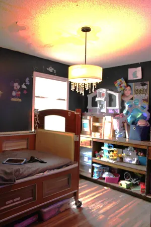 a living room with furniture and a table