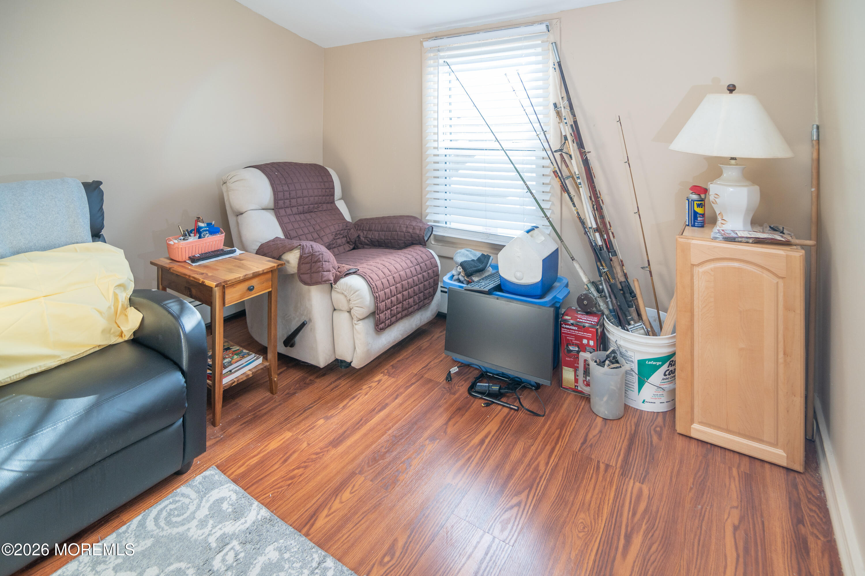 55 Lower Main Street Aberdeen, NJ 07747 - Photo 14 of 28 a bedroom with furniture and a wooden floor
