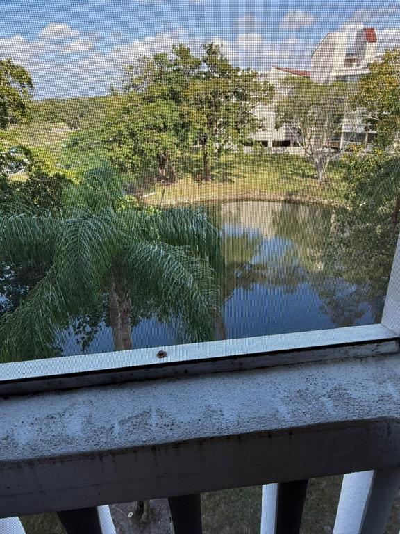 7081 Environ Boulevard, Unit 440 Lauderhill, FL 33319 - Photo 9 of 25 Water and Lush Green Views From Balcony