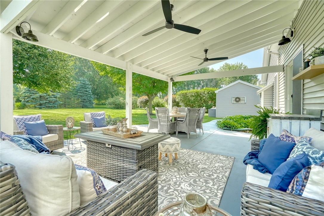 522 Salt Road Webster, NY 14580 - Photo 34 of 46 Expansive covered concrete patio with ceiling fans