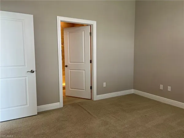 $2,450 | 15114 Palmer Lake Circle, Unit 202, Naples, FL 34109