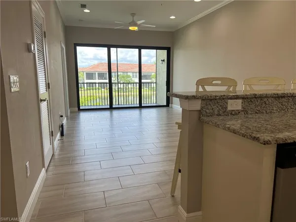 $2,450 | 15114 Palmer Lake Circle, Unit 202, Naples, FL 34109