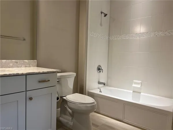 $2,450 | 15114 Palmer Lake Circle, Unit 202, Naples, FL 34109