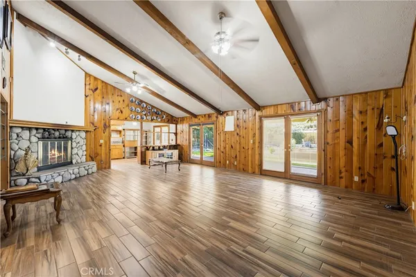 a view of an entryway with wooden floor