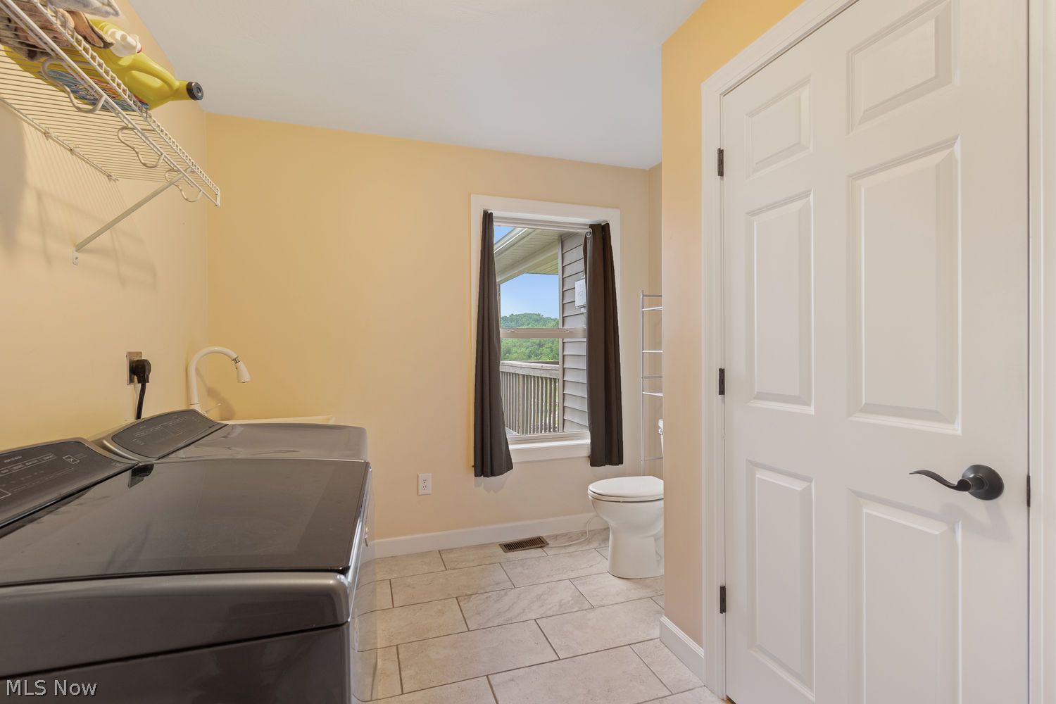 5230 Kinsey Valley Road Southwest New Philadelphia, OH 44663 - Photo 24 of 39 laundry/bath main floor