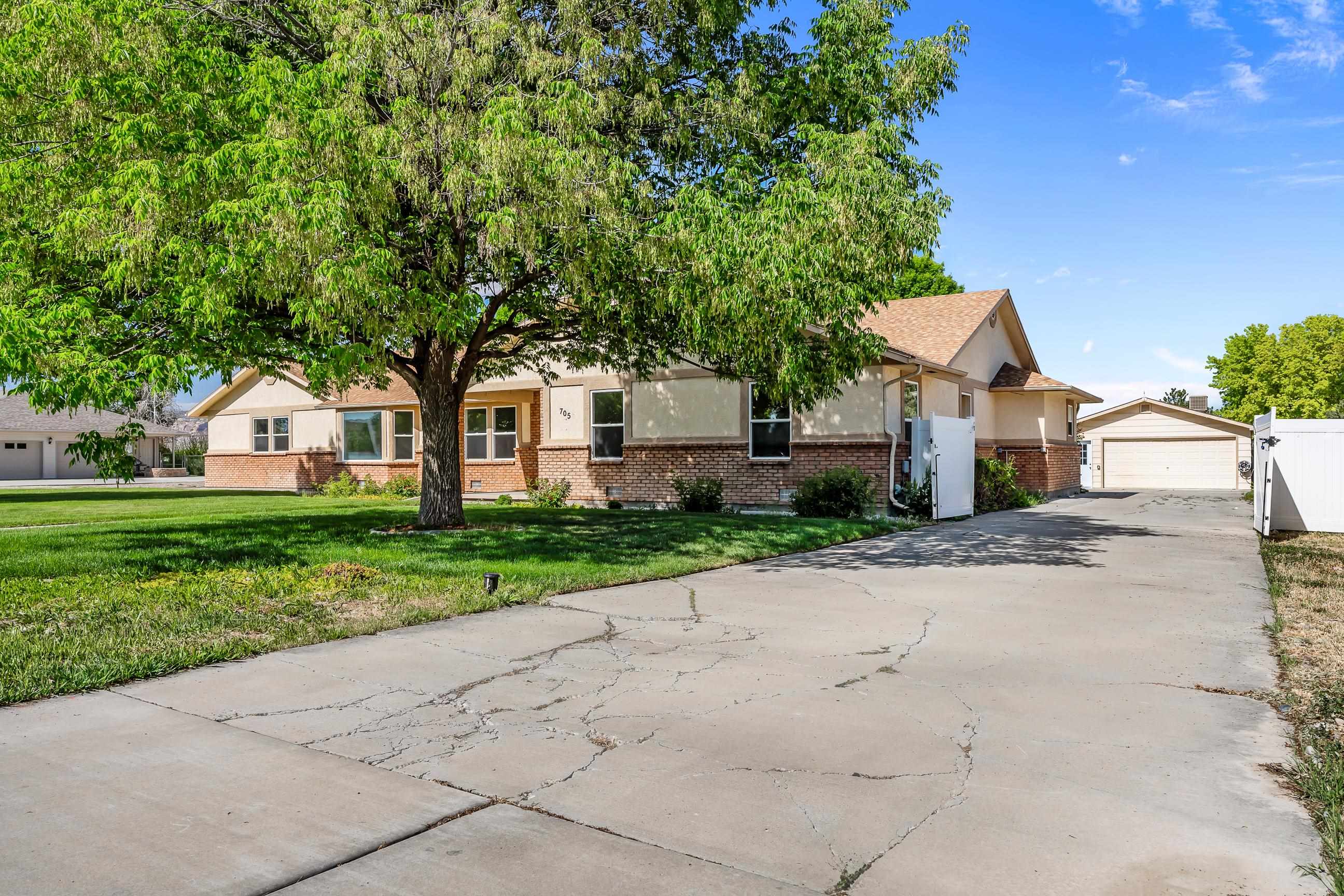 705-24 24 3/4 Road Grand Junction, CO 81505 - Photo 20 of 27 a view of backyard of house with green space