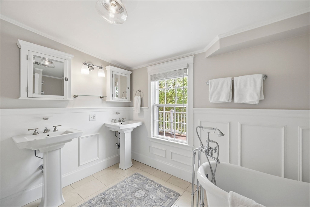 33 Franklin Street Marblehead, MA 01945 - Photo 32 of 42 a kitchen with a sink cabinets and window