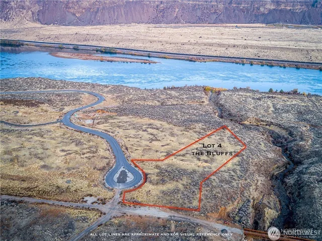 a view of a wooden floor with a bench in the background