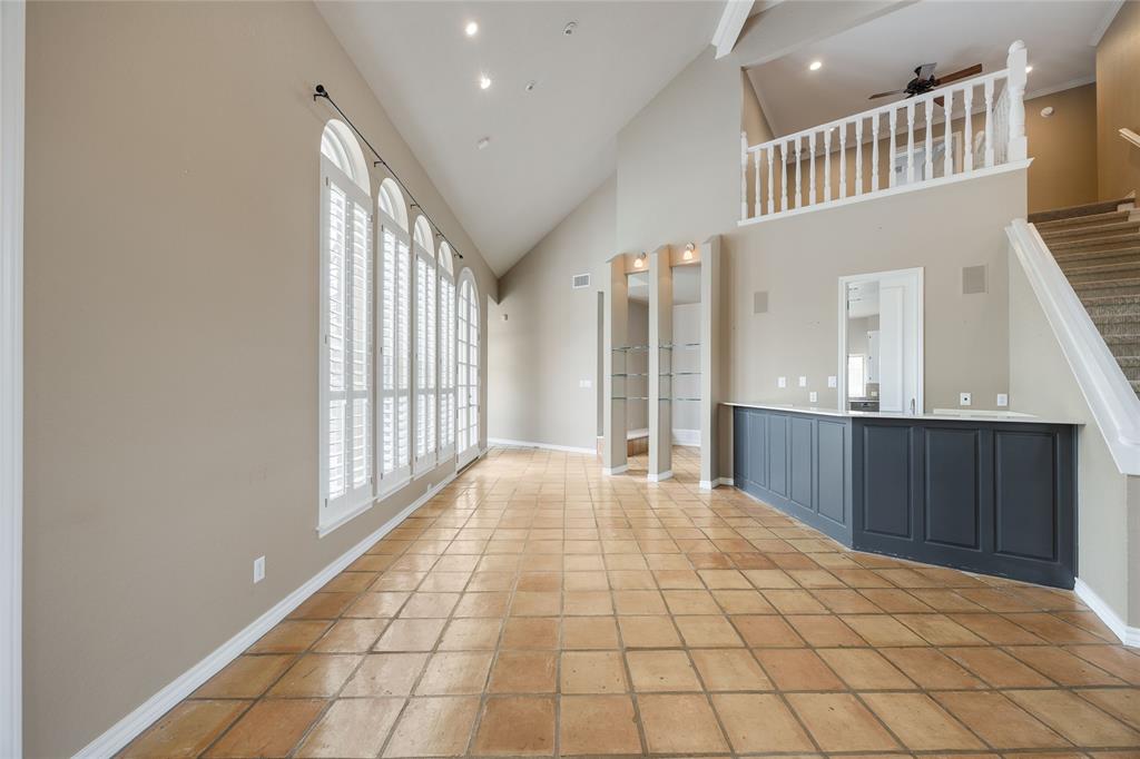 1201 Findlay Drive Arlington, TX 76012 - Photo 9 of 35 a view of a hallway with wooden floor and staircase