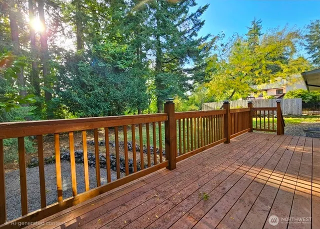 a view of balcony with wooden floor and fence