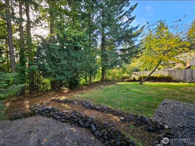 a view of backyard with green space