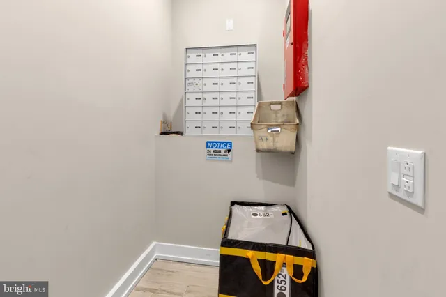 view of a room with a small space and racks on the wall