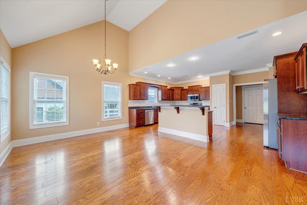 1250 Our Cove Road Huddleston, VA 24104 - Photo 12 of 70 a view of a kitchen with a sink cabinets and wooden floor