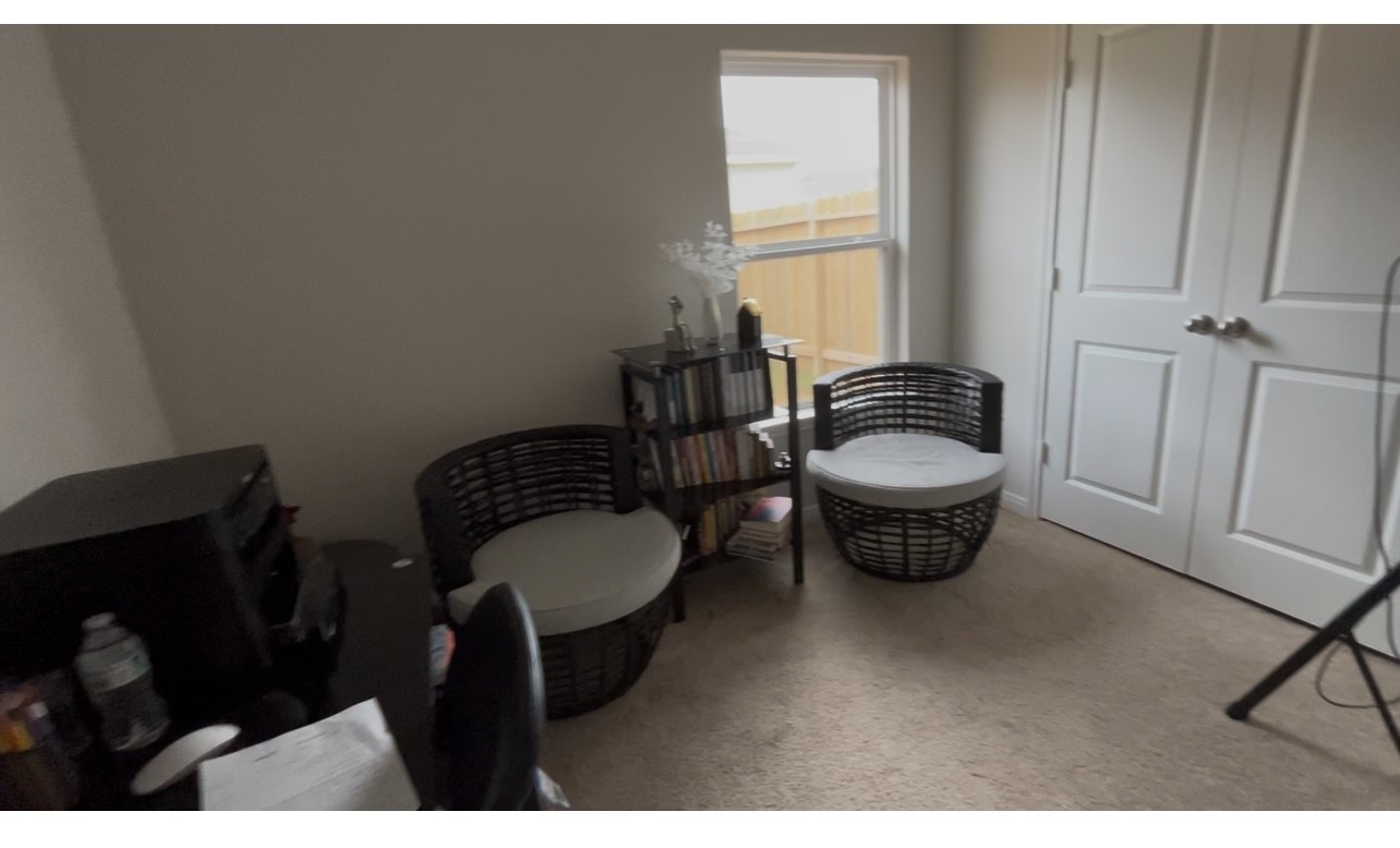 16351 Sweet Grv Drive Conroe, TX 77303 - Photo 13 of 19 a balcony with furniture and a window