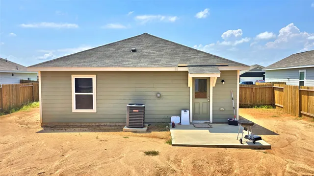 a front view of a house with a patio