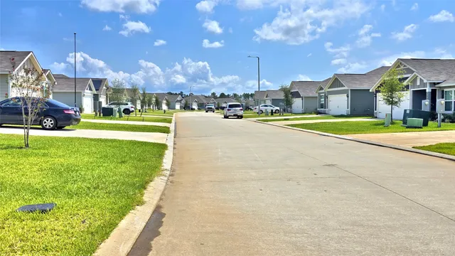 a view of a street with houses