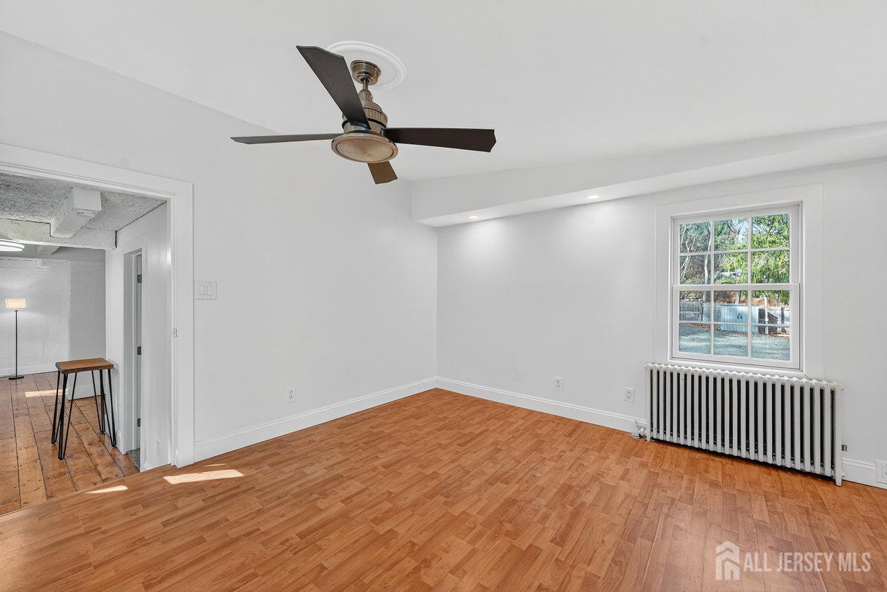 28 Old Clinton Road Flemington, NJ 08822 - Photo 16 of 39 wooden floor in an empty room with a window