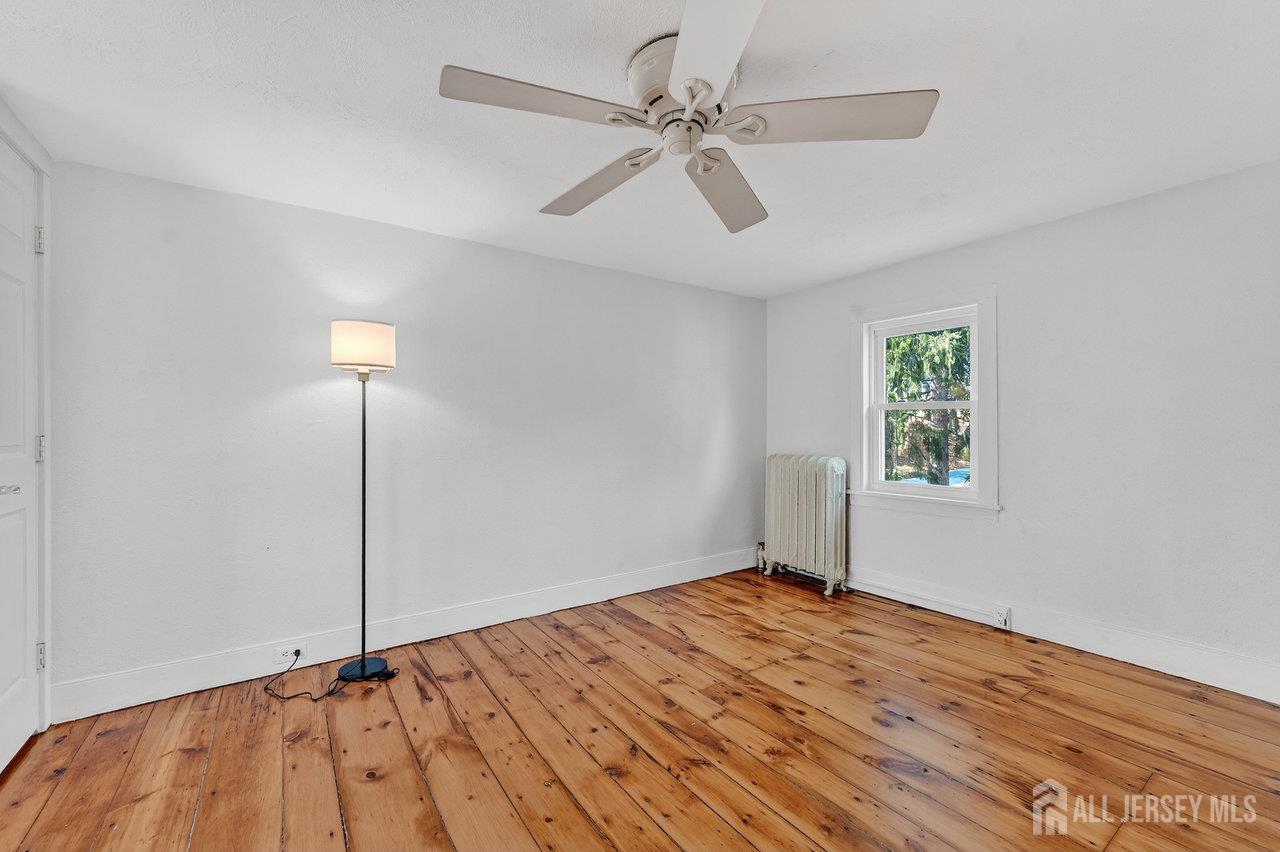 28 Old Clinton Road Flemington, NJ 08822 - Photo 20 of 39 a view of empty room with wooden floor