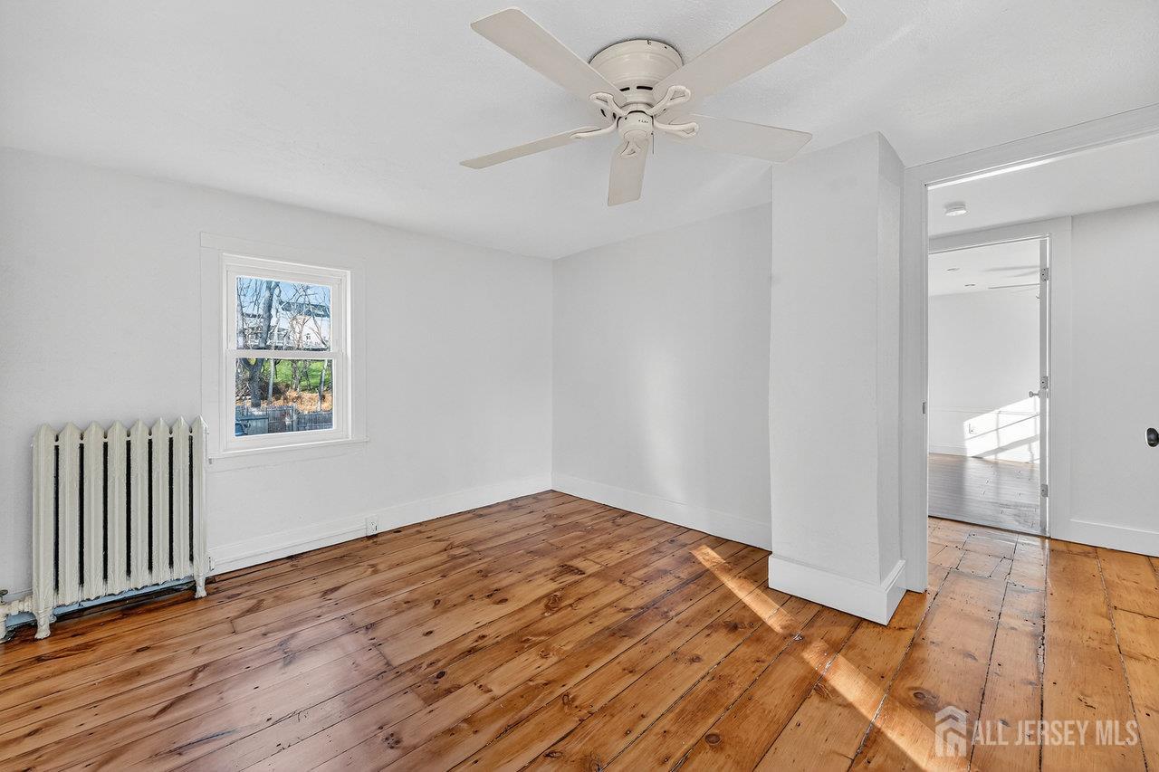 28 Old Clinton Road Flemington, NJ 08822 - Photo 25 of 39 a view of empty room with wooden floor