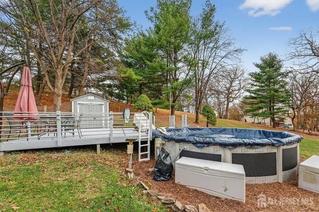 a view of a brick house with large windows