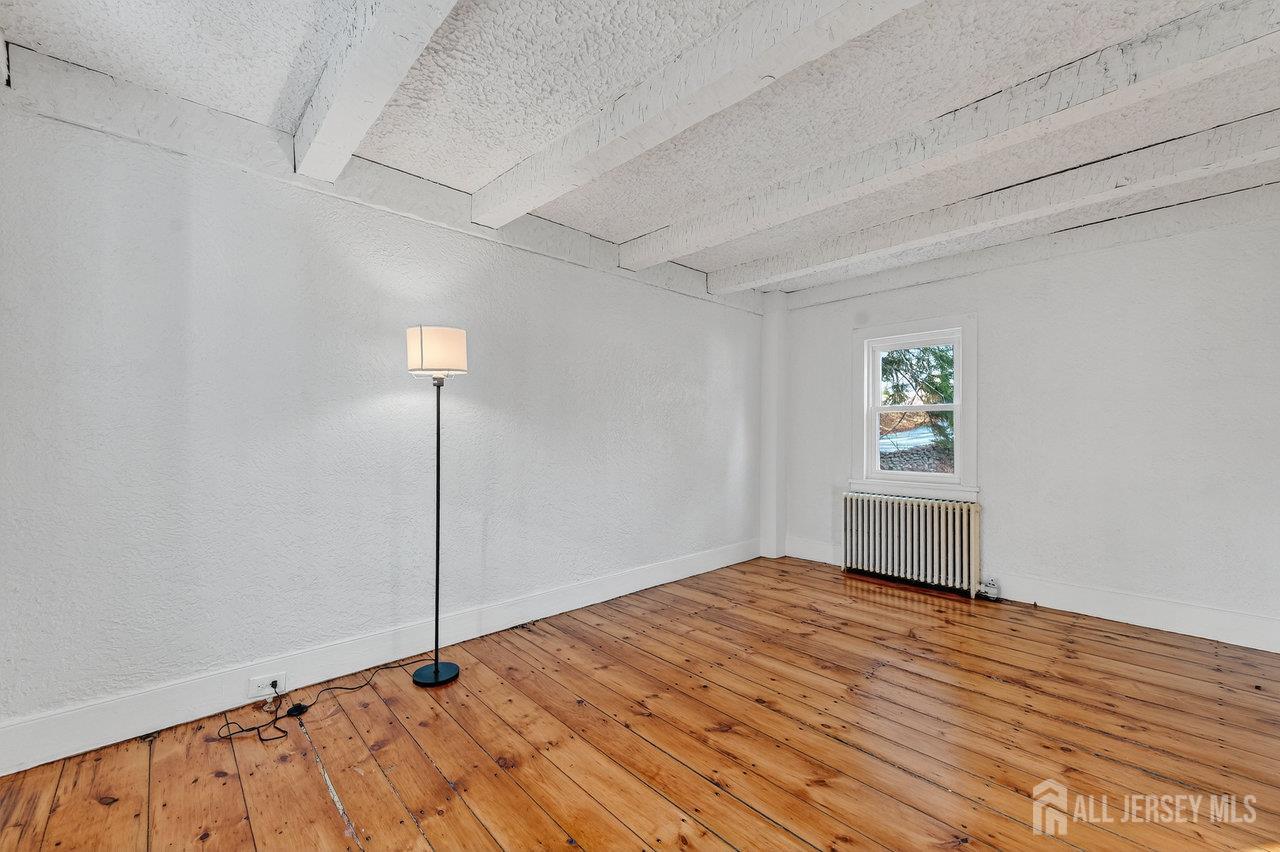 28 Old Clinton Road Flemington, NJ 08822 - Photo 7 of 39 a view of empty room with wooden floor