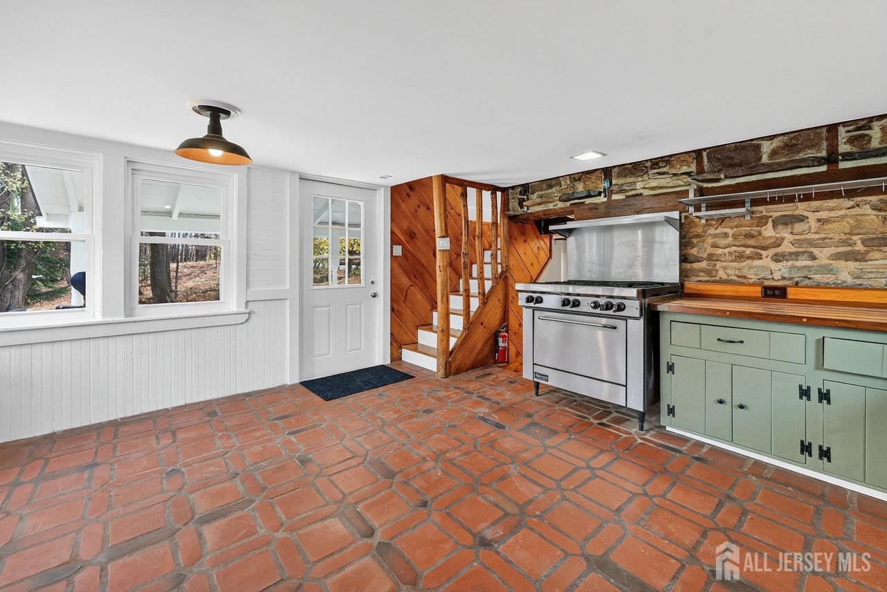 28 Old Clinton Road Flemington, NJ 08822 - Photo 8 of 39 a kitchen with stainless steel appliances a stove and a refrigerator