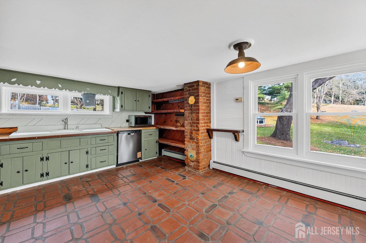 28 Old Clinton Road Flemington, NJ 08822 - Photo 9 of 39 a kitchen with a cabinets and window