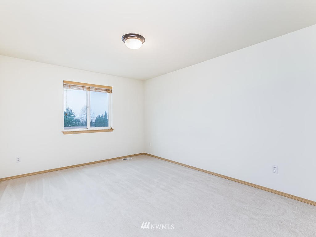 17022 105th Avenue Southeast Renton, WA 98055 - Photo 12 of 20 an empty room with windows