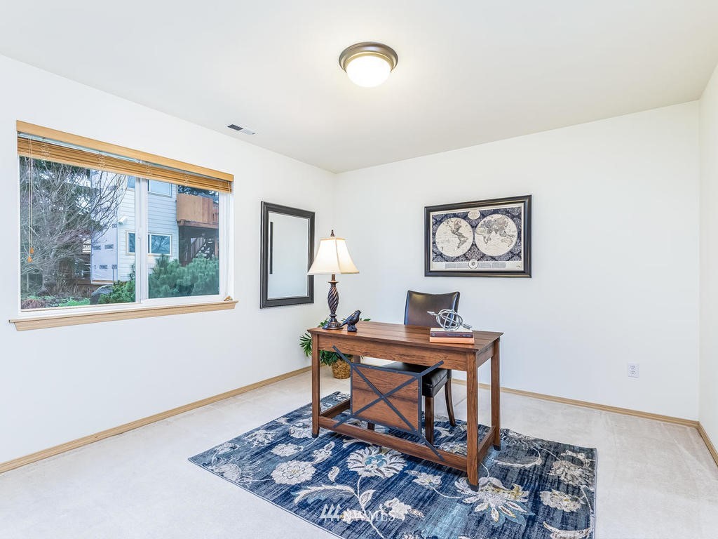 17022 105th Avenue Southeast Renton, WA 98055 - Photo 14 of 20 a work room with furniture and a window