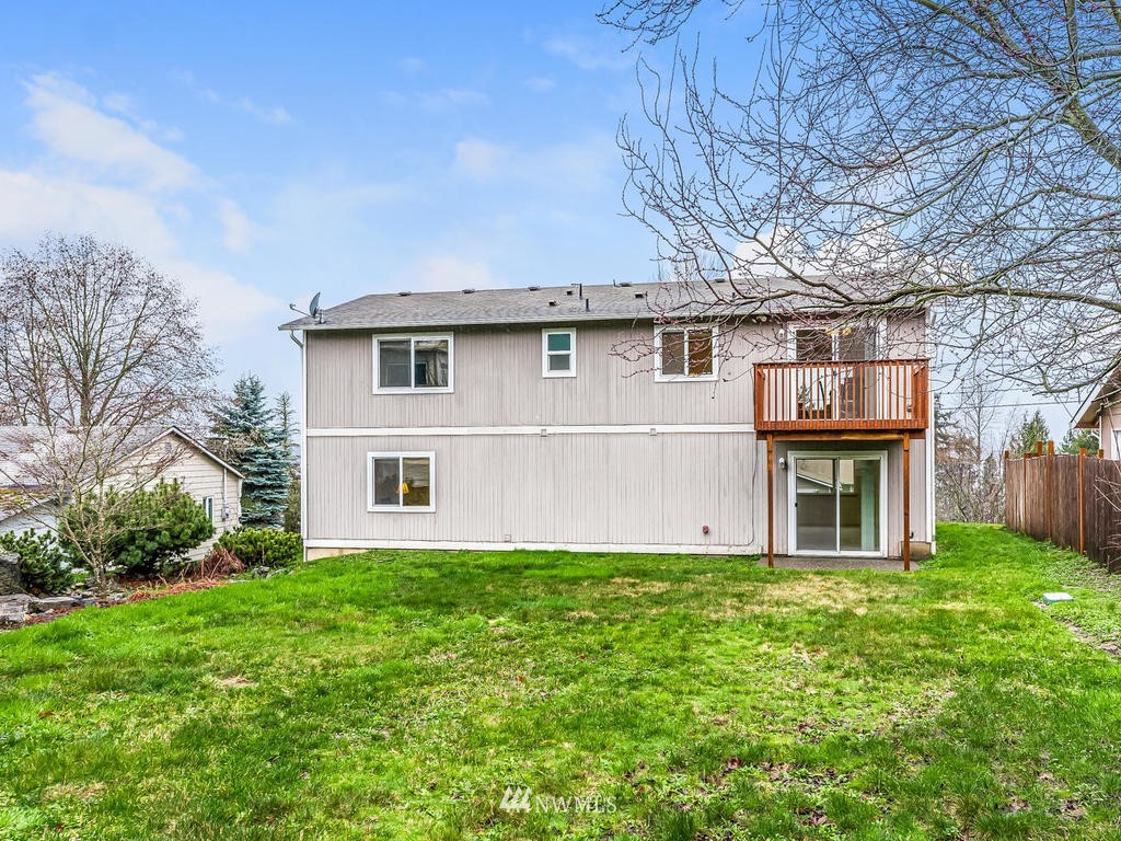 17022 105th Avenue Southeast Renton, WA 98055 - Photo 17 of 20 front view of a house with a yard