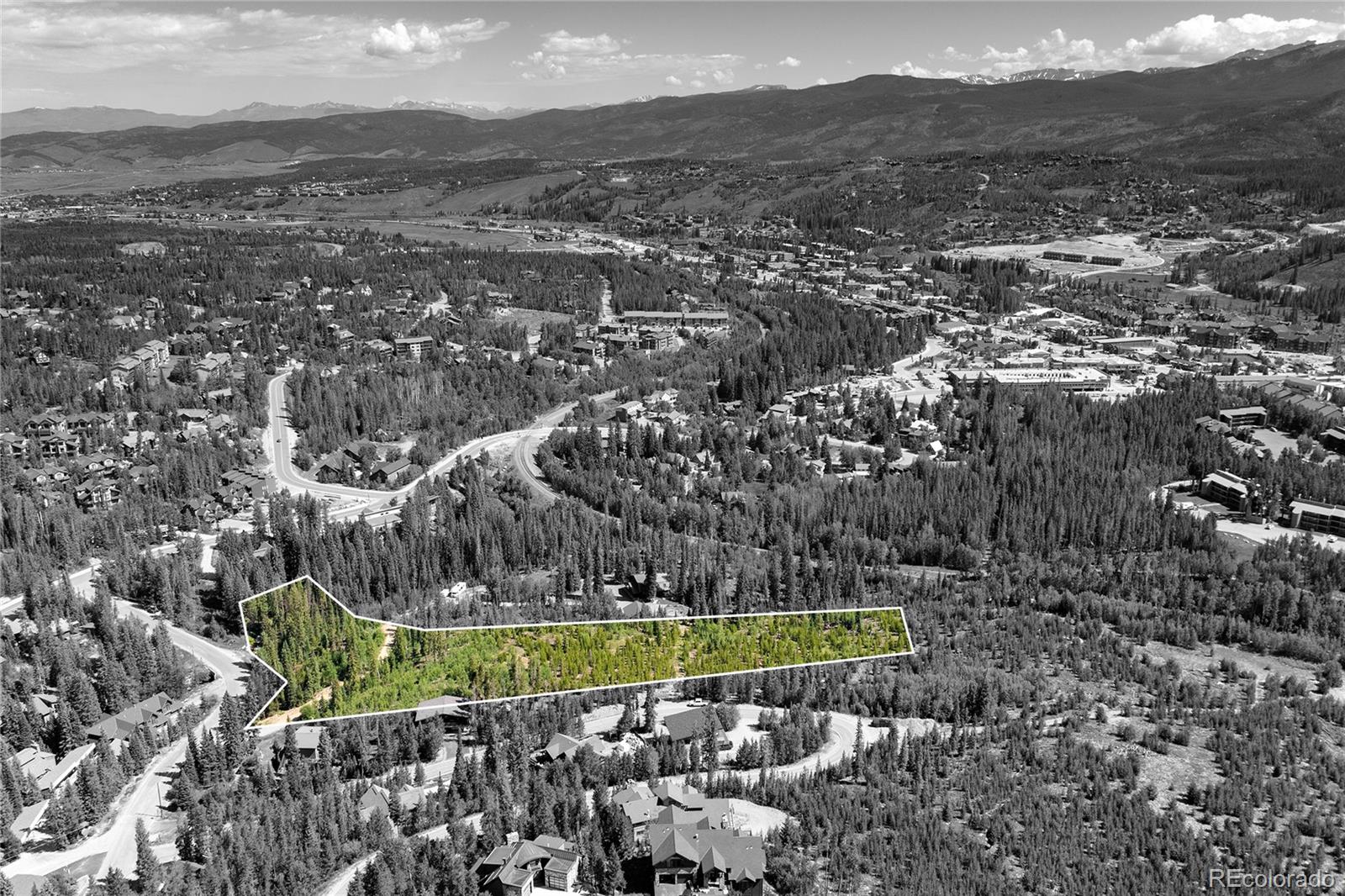 100 Arapahoe Road Winter Park, CO 80482 - Photo 14 of 34 a view of a city with mountains in the background