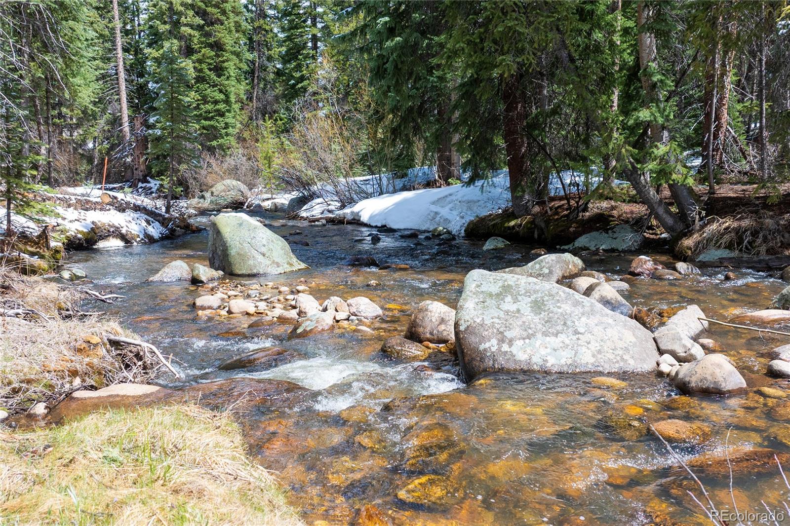 100 Arapahoe Road Winter Park, CO 80482 - Photo 19 of 34 a view of a backyard of the house