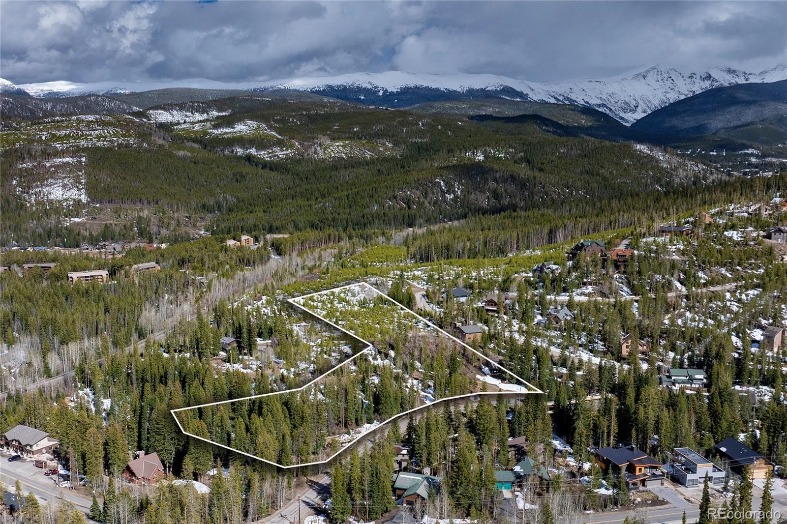 100 Arapahoe Road Winter Park, CO 80482 - Photo 26 of 34 a view of a lake with a mountain in the background