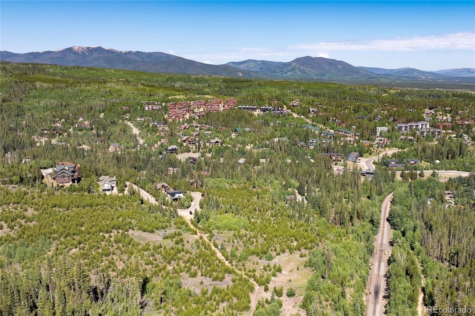 100 Arapahoe Road Winter Park, CO 80482 - Photo 30 of 34 a view of a lush green hillside and houses