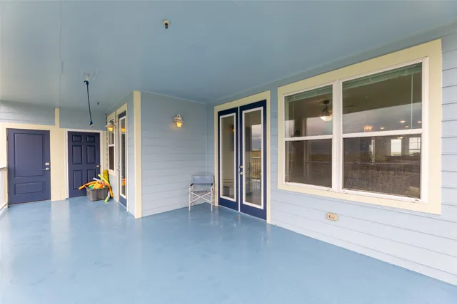 a view of a lake with houses in the background