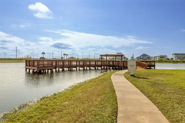 a view of a balcony with couch and wooden floor