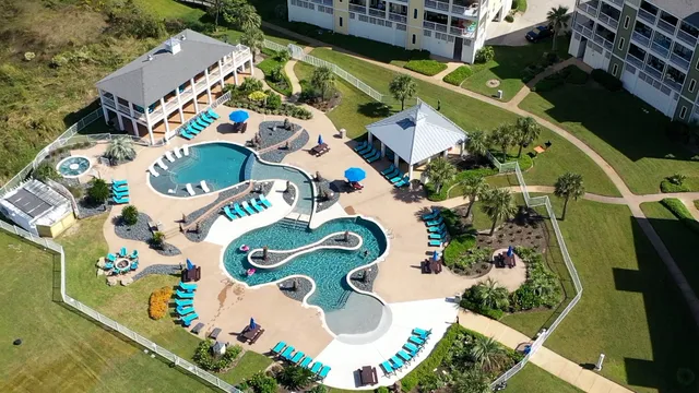 a view of a park with palm trees