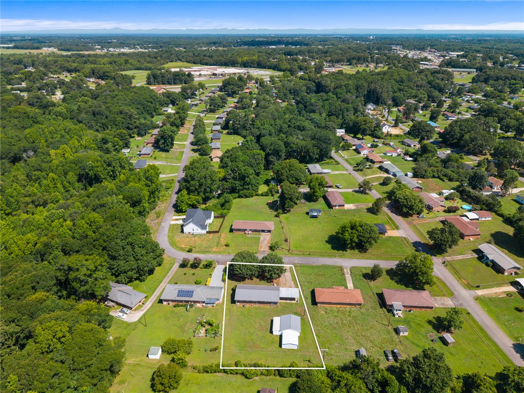 312 Edwards Drive Anderson, SC 29626 - Photo 41 of 44 An aerial perspective reveals a large, private lot amidst a green and peaceful residential area.