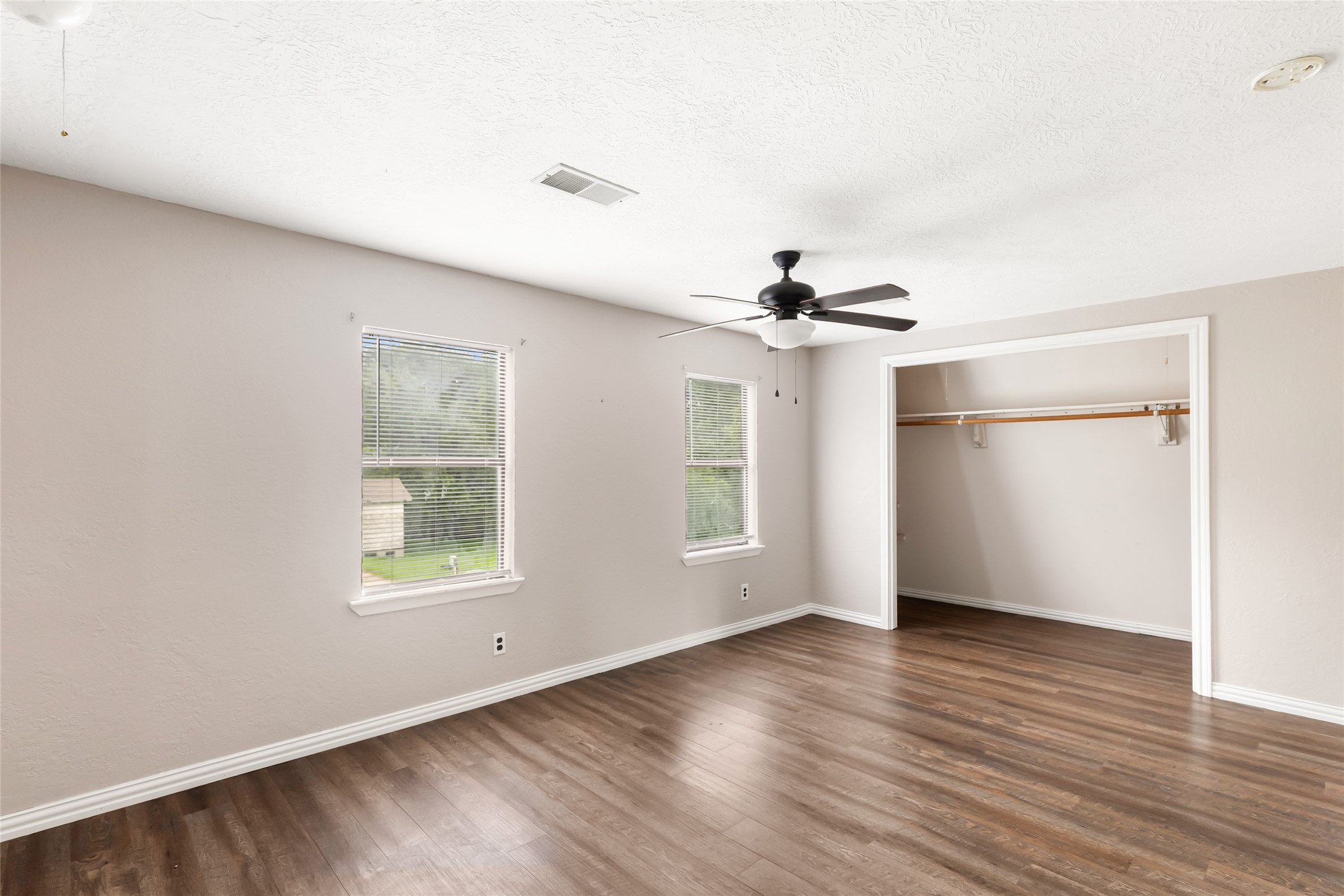 123 Burwell Road Highlands, TX 77562 - Photo 25 of 25 Bright spacious upstairs bedroom also with new flooring, paint and blinds