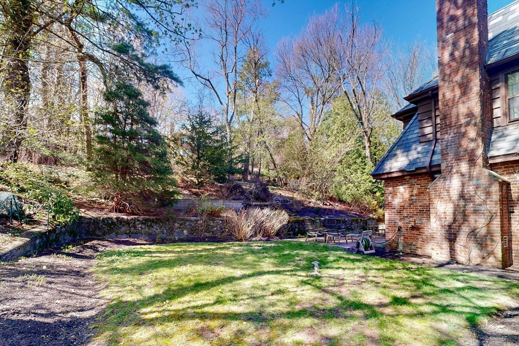 32 Alberta Road Brookline, MA 02467 - Photo 13 of 36 a backyard of a house