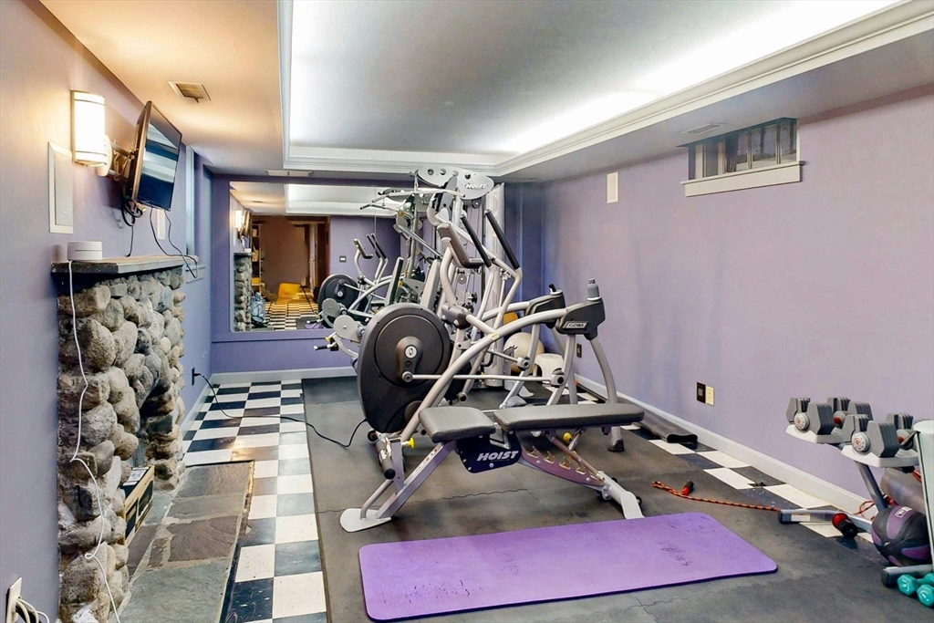 32 Alberta Road Brookline, MA 02467 - Photo 34 of 36 a view of a room with gym equipment