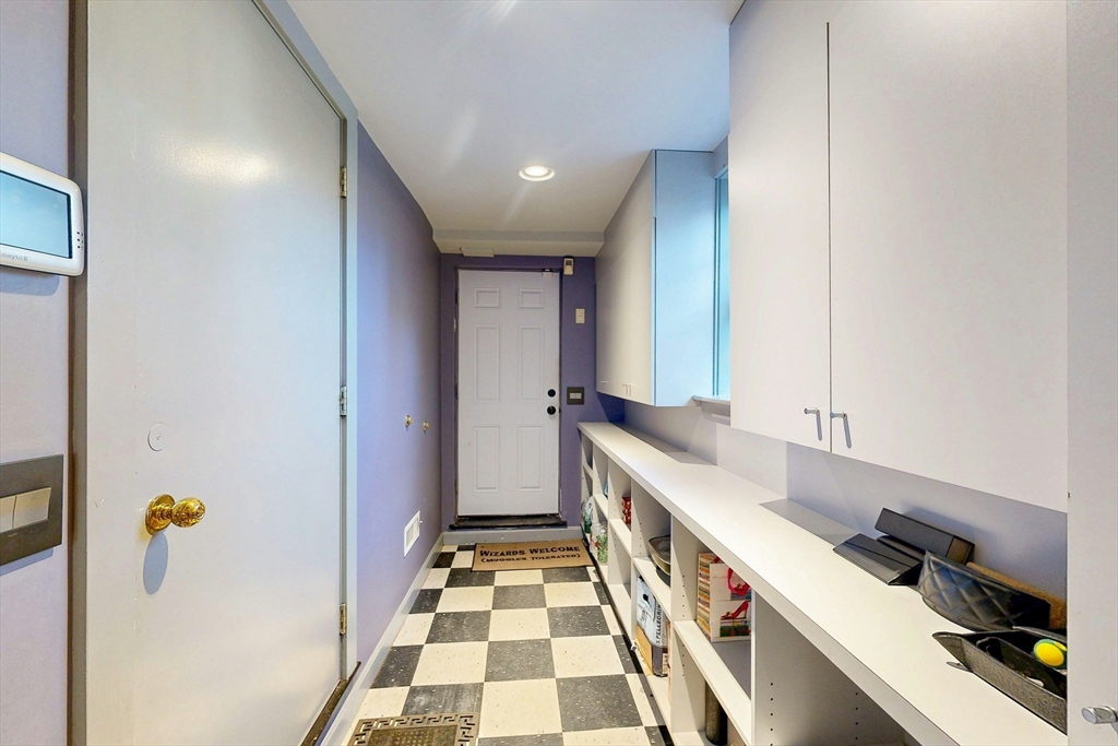 32 Alberta Road Brookline, MA 02467 - Photo 36 of 36 a kitchen with a sink and a stove top oven