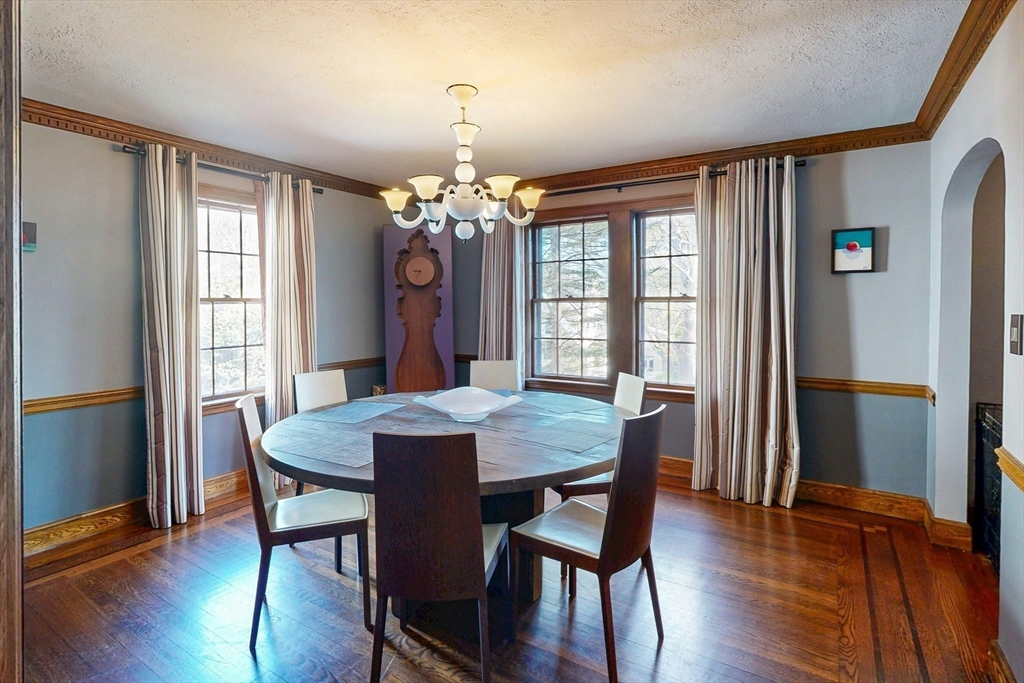 32 Alberta Road Brookline, MA 02467 - Photo 10 of 36 a view of a dining room with furniture wooden floor and chandelier