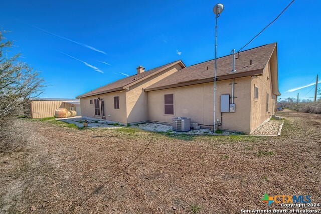 6197 Pfeil Road Schertz, TX 78154 - Photo 25 of 29 a view of a house with backyard