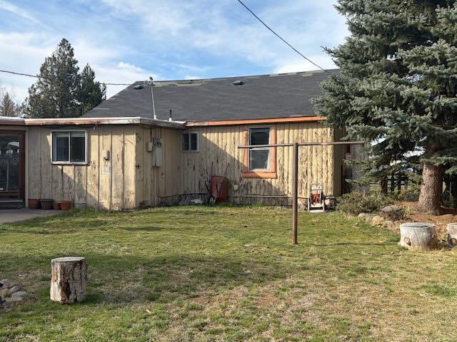 243 West Adams Avenue Sisters, OR 97759 - Photo 19 of 19 a backyard of a house with seating space