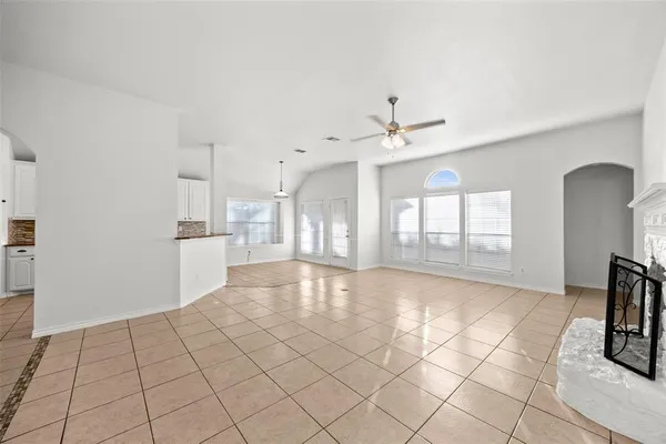 a view of an empty room and window