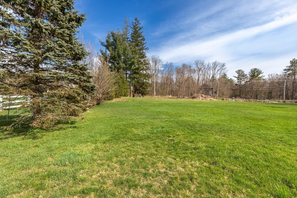 0 Locke Road Chelmsford, MA 01824 - Photo 12 of 18 a view of grassy field with trees