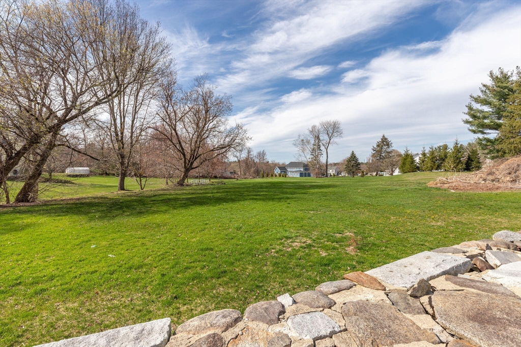 0 Locke Road Chelmsford, MA 01824 - Photo 5 of 18 a view of a golf course with a garden
