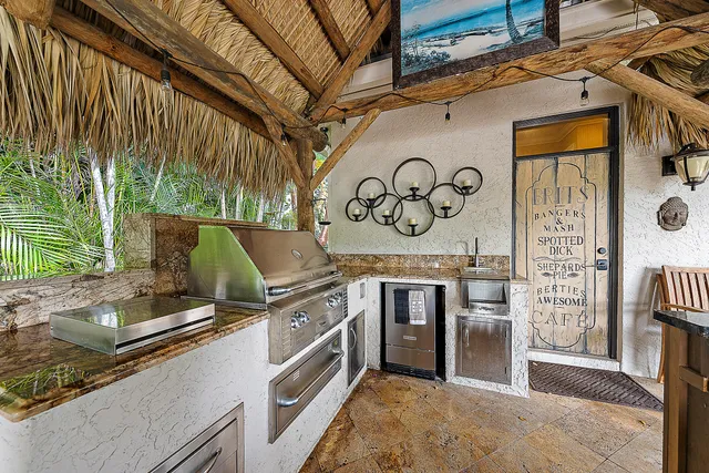 a view of a swimming pool with a yard and plants