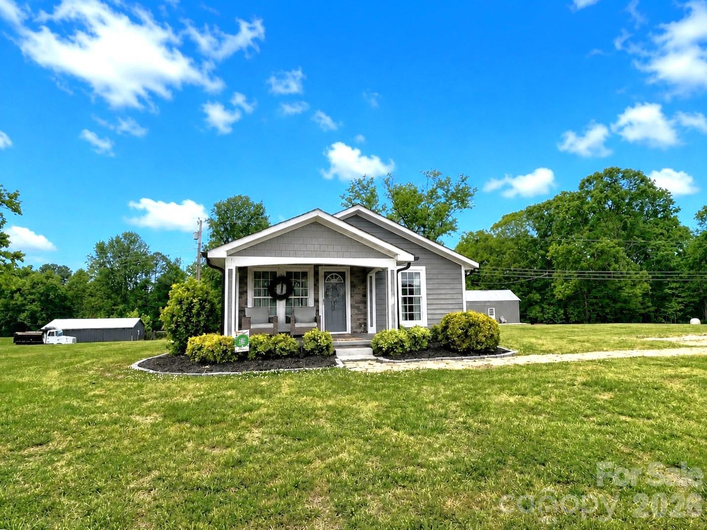 755 Depriest Road Bostic, NC 28018 - Photo 29 of 38 a front view of a house with garden
